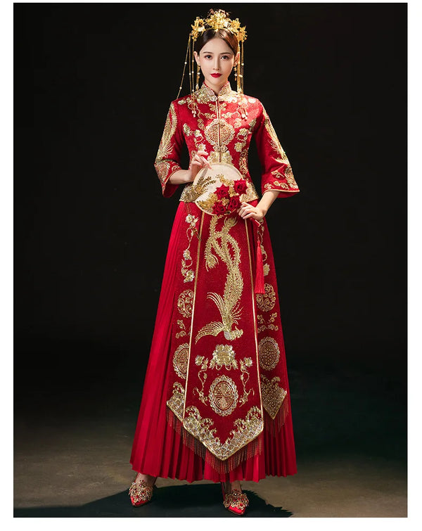 Woman wearing a red and gold Traditional chinese Wedding Bridal  Qun Kwa Dress on a dark background