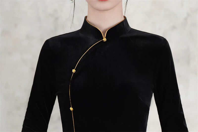 Black traditional outfit Long Sleeves  Velvet Qipao Dress with Gold Accents with gold accents on a neutral background