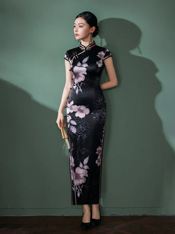 Woman wearing a Black Silk Chinese Qipao Dress – Elegant Mandarin Collar Cheongsam against a green wall