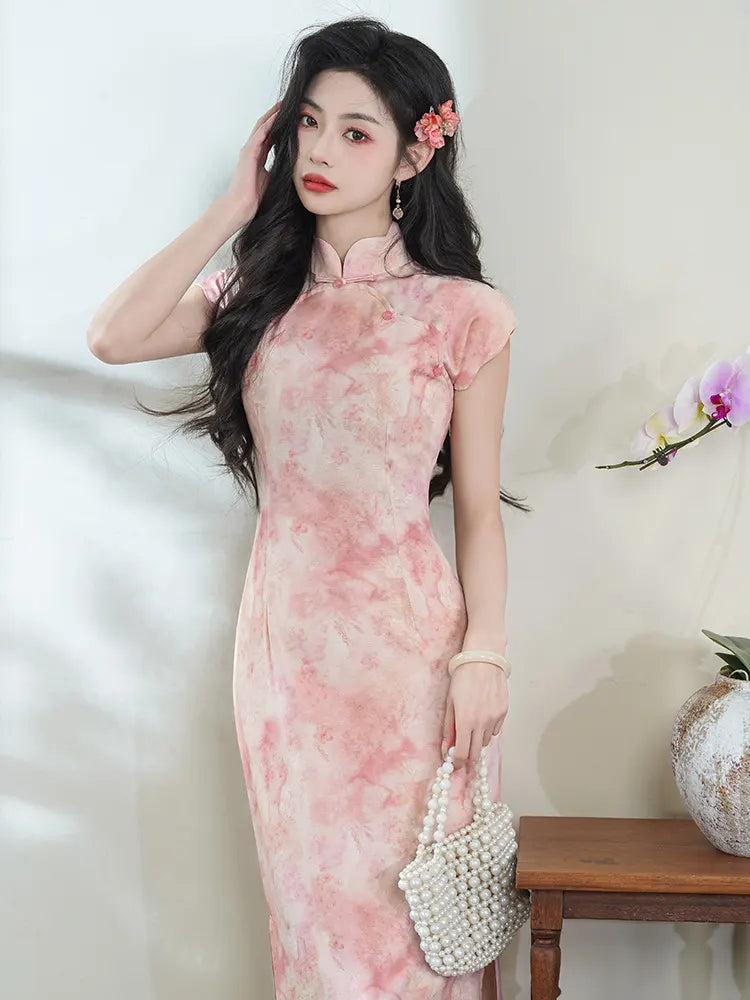 Woman wearing a Pink Floral Watercolor Long Qipao Dress with a white background