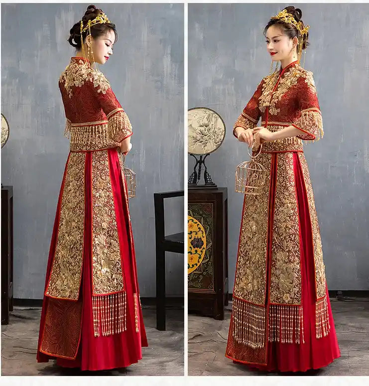 Traditional Red Glittering Qun Kwa Wedding Dress – Traditional Chinese Bridal Attire worn by a woman on a gray textured wall background
