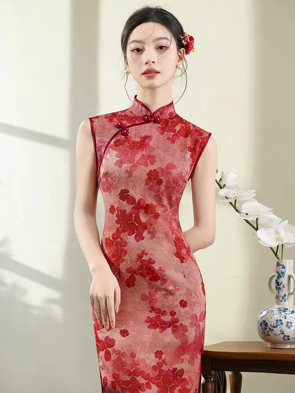 Woman wearing a Red Sleeveless Floral Qipao Dress – Modern Chinese Cheongsam with a vase and flowers in the background