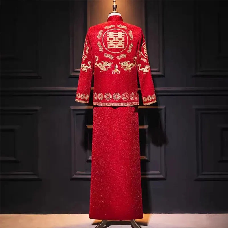 Traditional red wedding outfit  for groom with intricate gold embroidery on a dark background