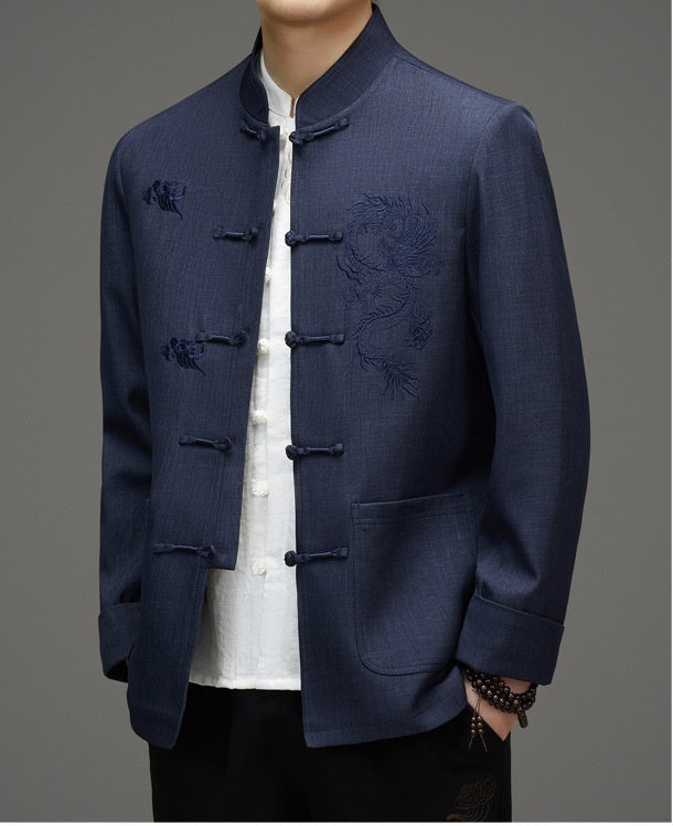 A men in blue tang jacket with dragon and cloud embroidery