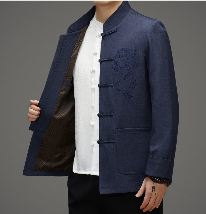 A men in blue formal tang mandarin jacket with dragon and cloud embroidery