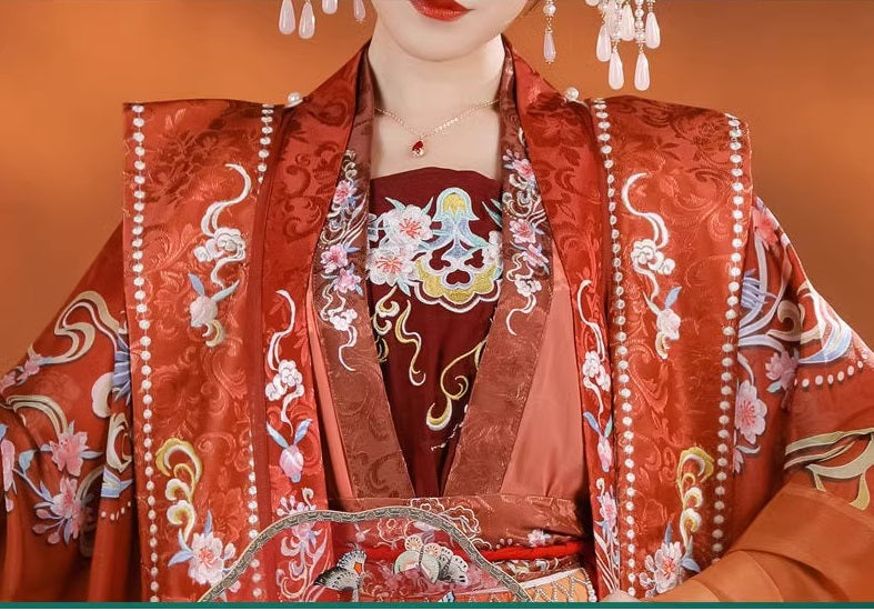 model in Red bridal wedding song hanfu sitting close up