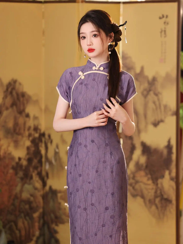 Woman in a traditional purple Lavender Floral Short Sleeves Jacquard Qipao Dress dress standing against a decorative background