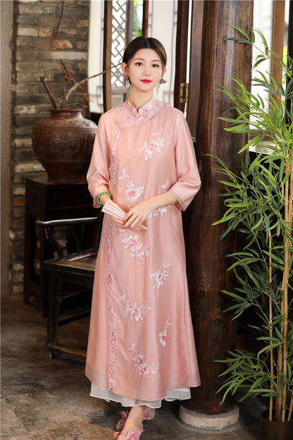 Model in pink floral chinese loose qipao cheongsam dress looking straight