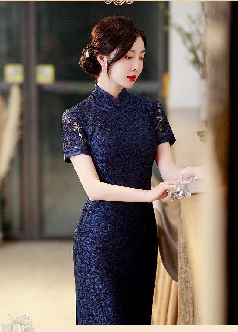 model in navy blue lace qipao cheongsam dress looking  right