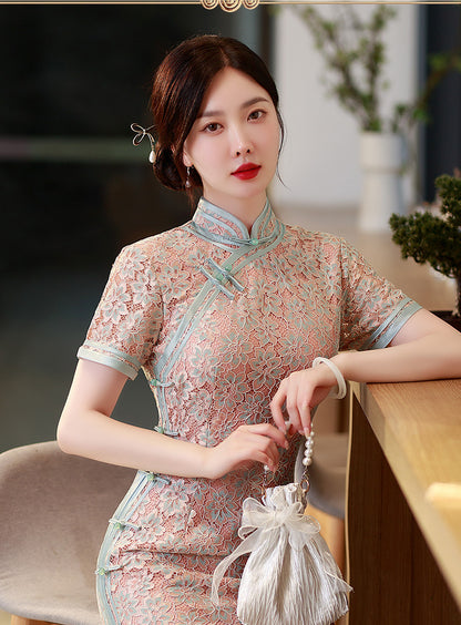 Model in pink lace qipao sitting