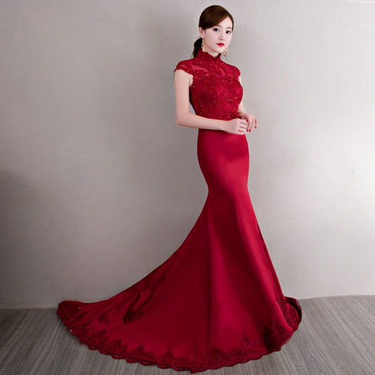 Model in Red bridal qipao cheongsam standing 
