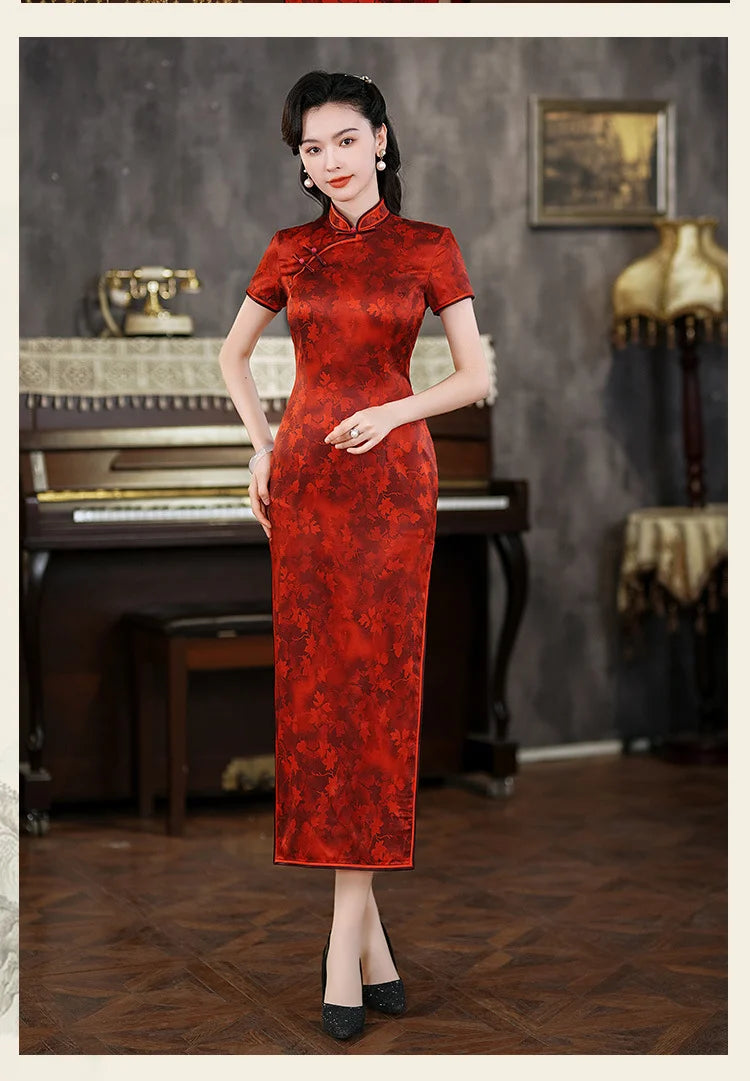 Woman in a red traditional Luxury Red Silk Qipao Dress with Maple Leaves Print standing in an elegant room with a piano.