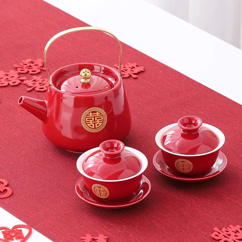 Traditional Chinese gold Double Happiness Wedding red Tea Set  with on a red tablecloth