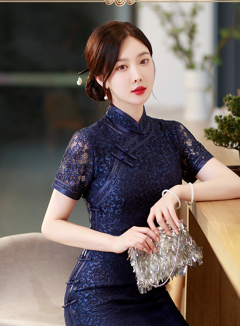 model in navy blue lace qipao cheongsam dress sitting