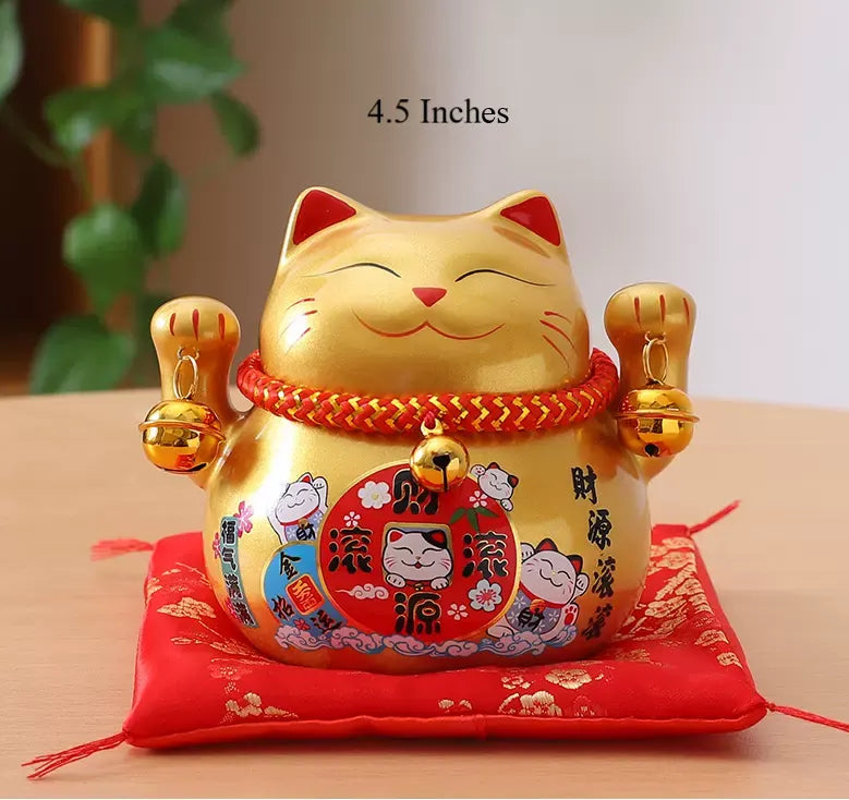 Golden Lucky Cat bring prosperity and good fortune into your space , also known as Maneki Neko
