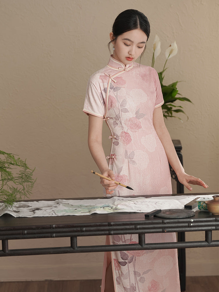 Short  Sleeves pink rose printed qipao cheongsam dress full length model looking down writing
