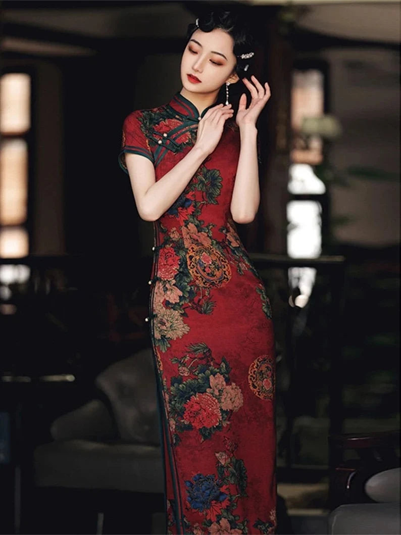 Woman wearing a Vintage Red Chinese Floral Qipao Cheongsam evening gown in an indoor setting