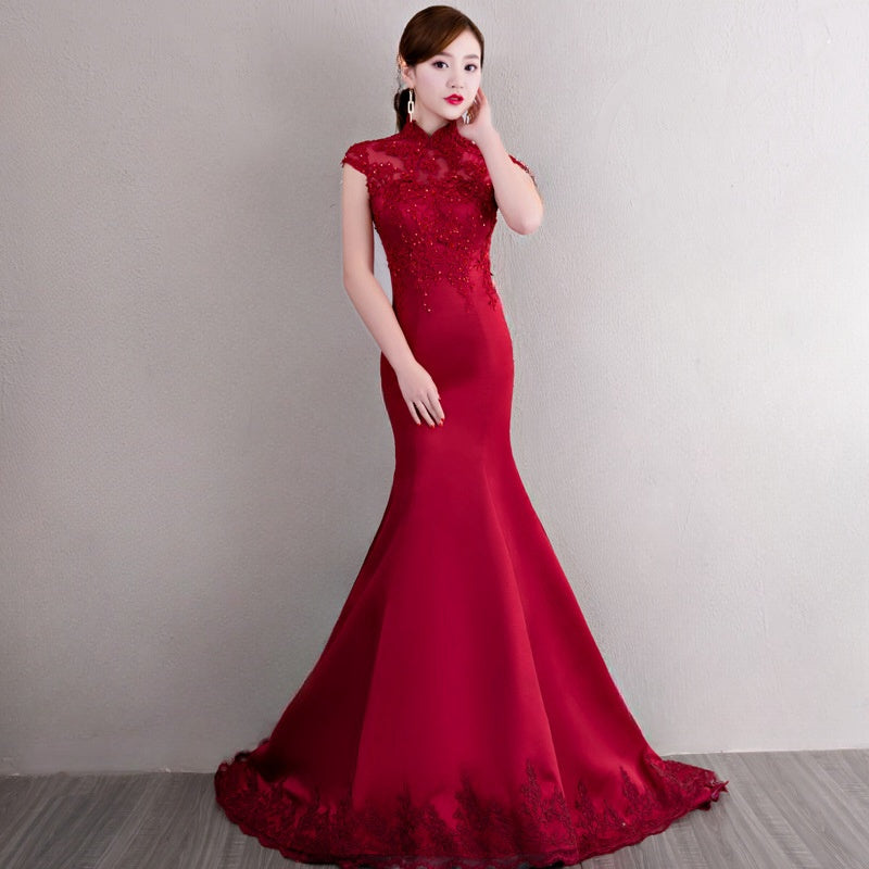 Model in Red bridal qipao cheongsam looking straight