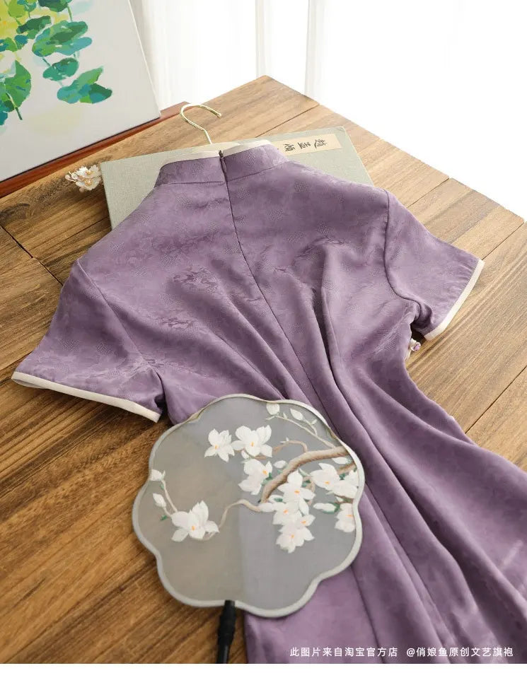 Purple traditional Lavender Floral Short Sleeves Jacquard cheongsam outfit with floral design on a wooden surface