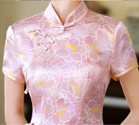 Pink Floral Mullbury Silk Short Sleeves Qipao Dress  with yellow accents on a blurred background