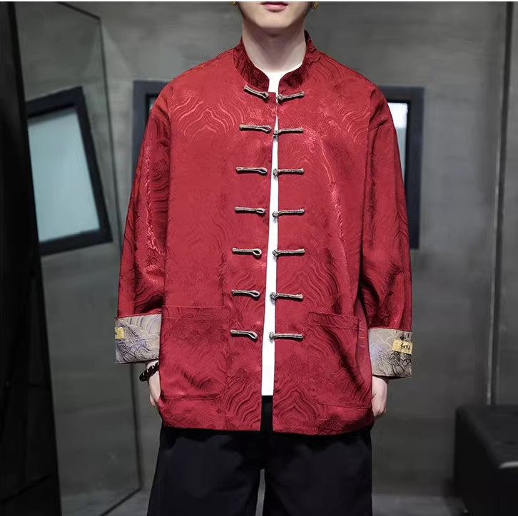 Model in Red brocade tang jacket with frog buttons open