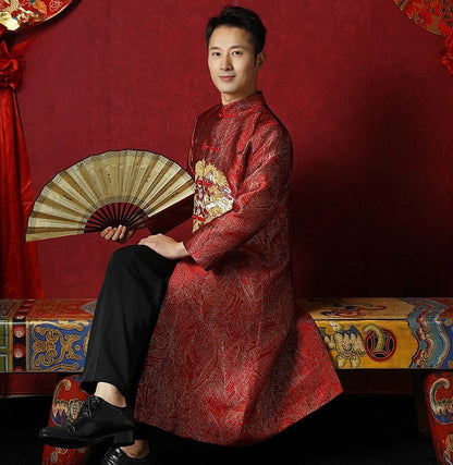 Red chinese groom dragon tang jacket sit