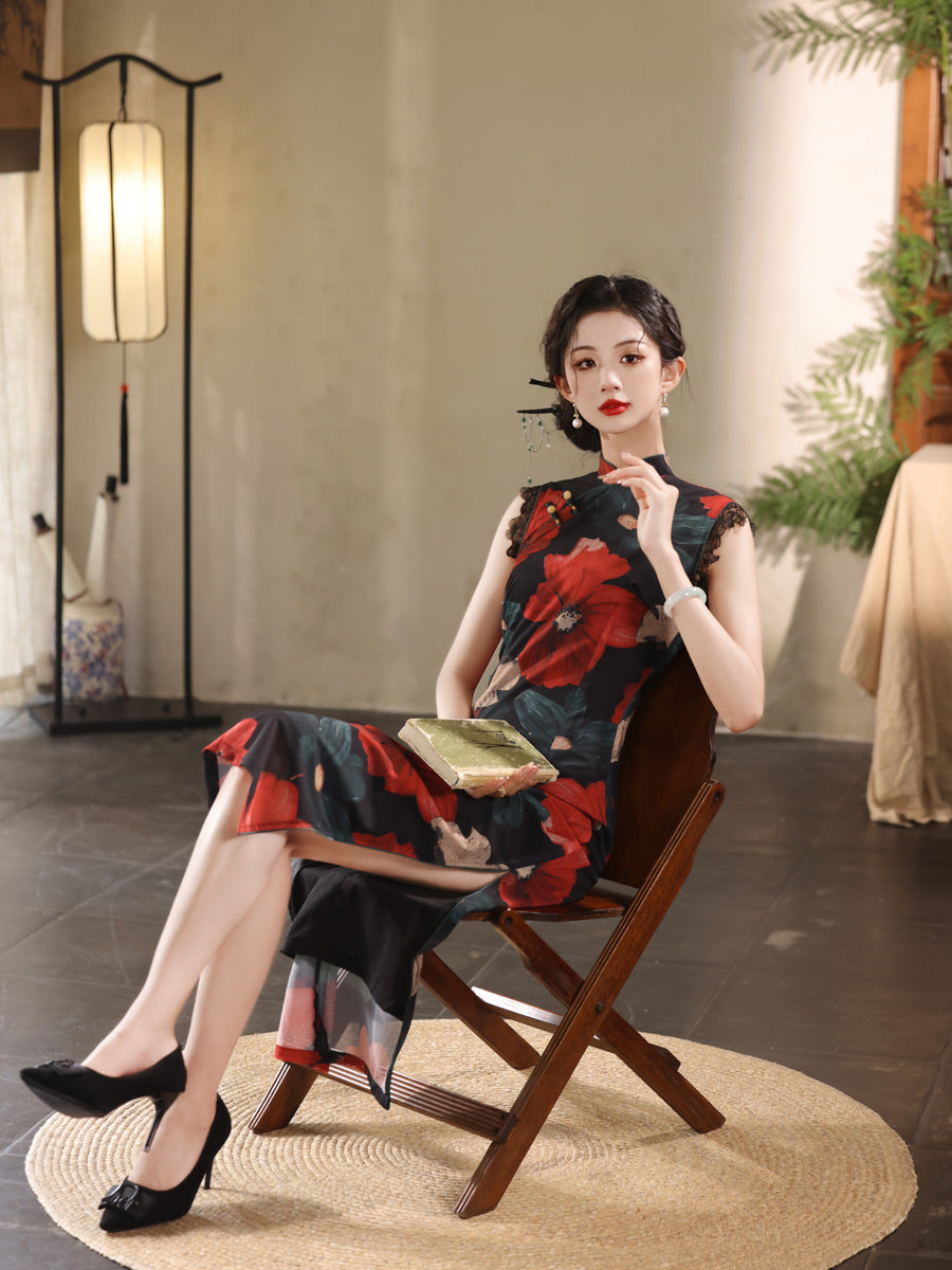 model in black and red floral qi pao cheongsam dress sitting