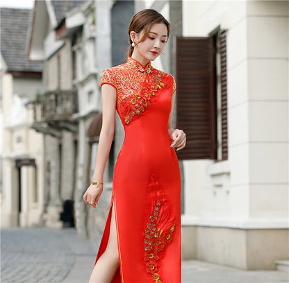 model in Red and gold floral qipao cheongsam dress looking down