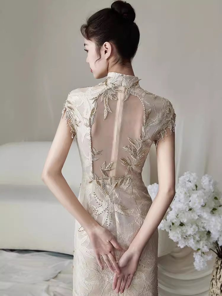 Model in ivory white floral fringe qipao cheongsam dress back