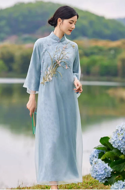 Model in blue Organza Embroidered Gauze Loose Cheongsam Qipao Dress looking down