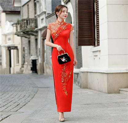 model in Red and gold floral qipao cheongsam dress looking right