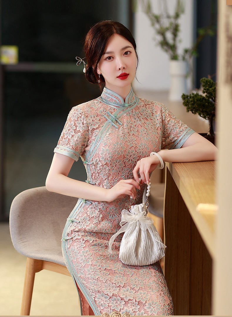 Model in pink lace qipao sitting