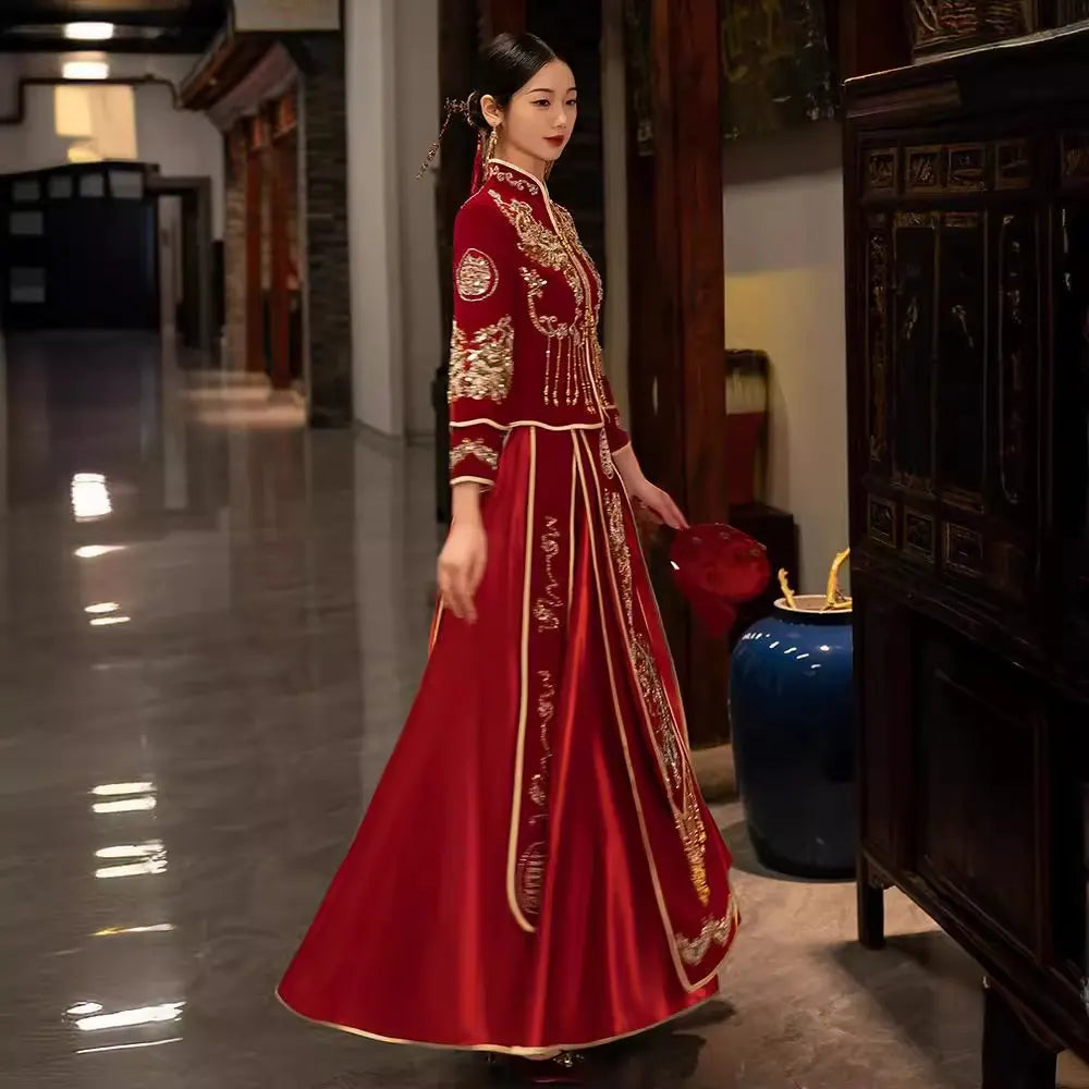 Woman in a Red Qun Kwa – Traditional Chinese Wedding Dress  in an indoor setting