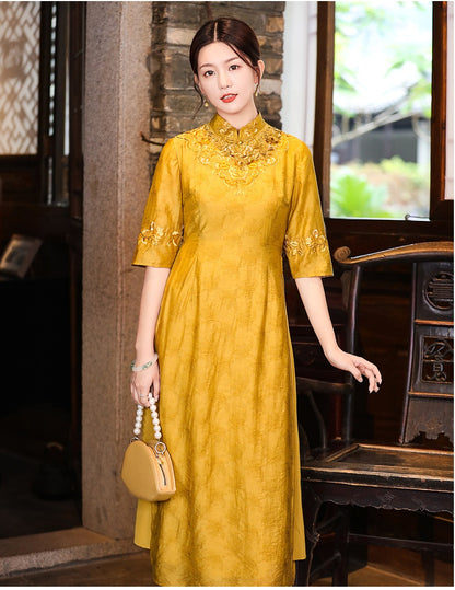 Model in loose yellow floral qipao cheongsam dress