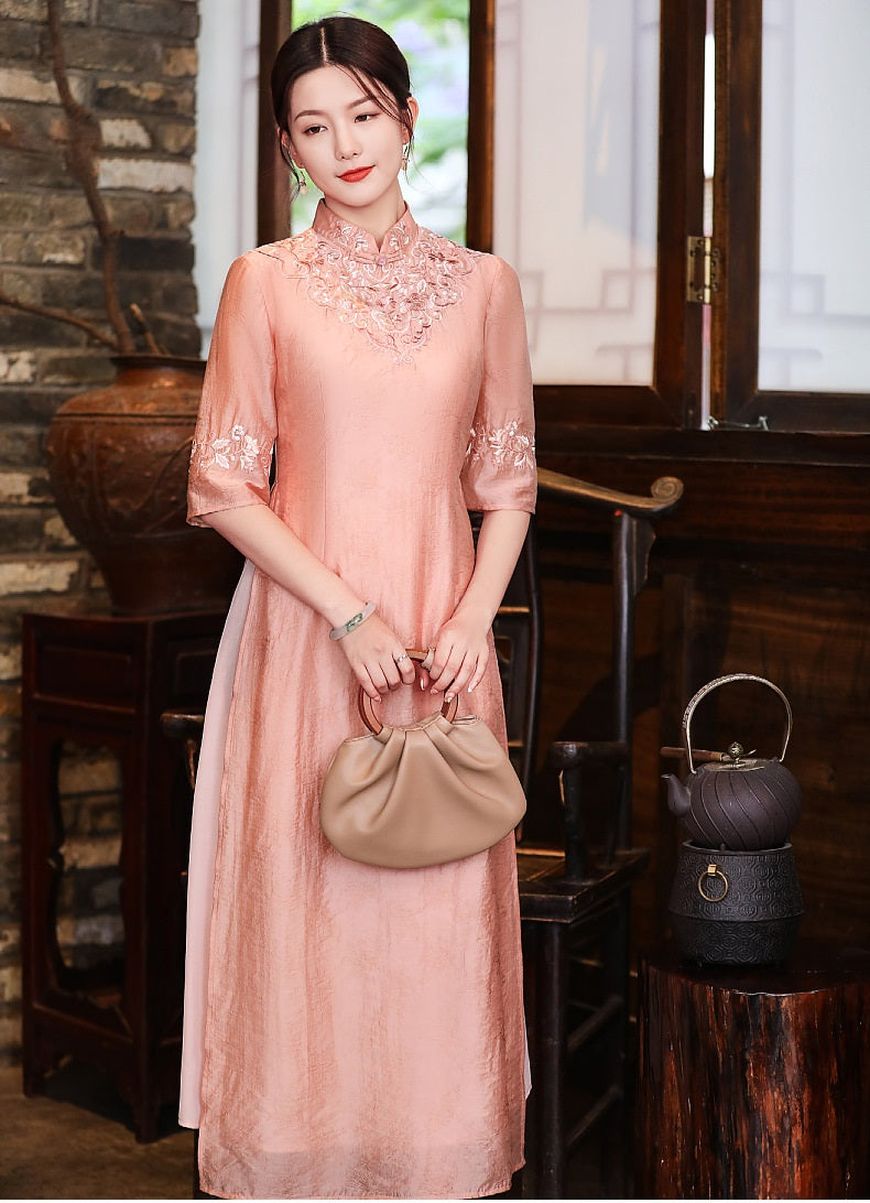 Model in loose pink  floral qipao cheongsam dress