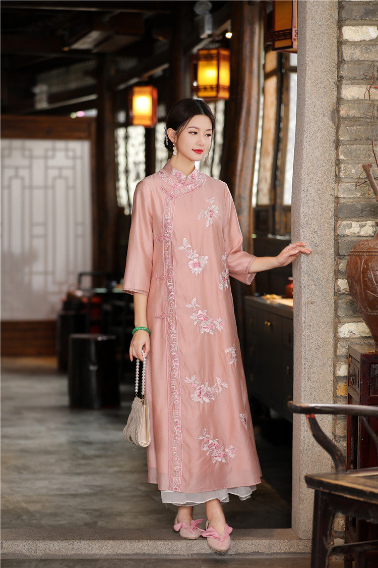 Model in pink floral chinese loose qipao cheongsam dress looking 