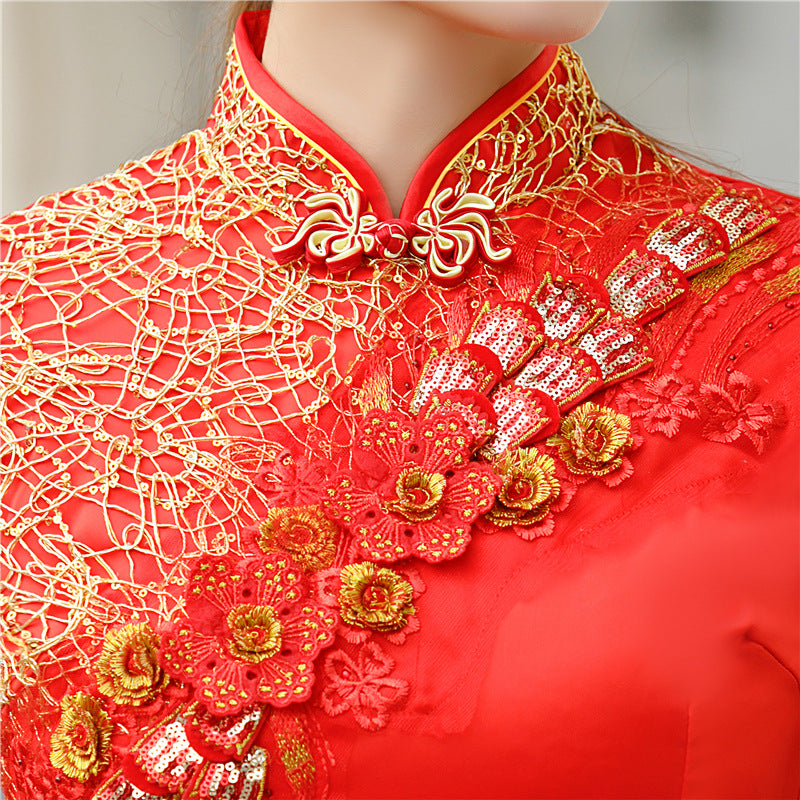 model in Red and gold floral qipao cheongsam dress detail