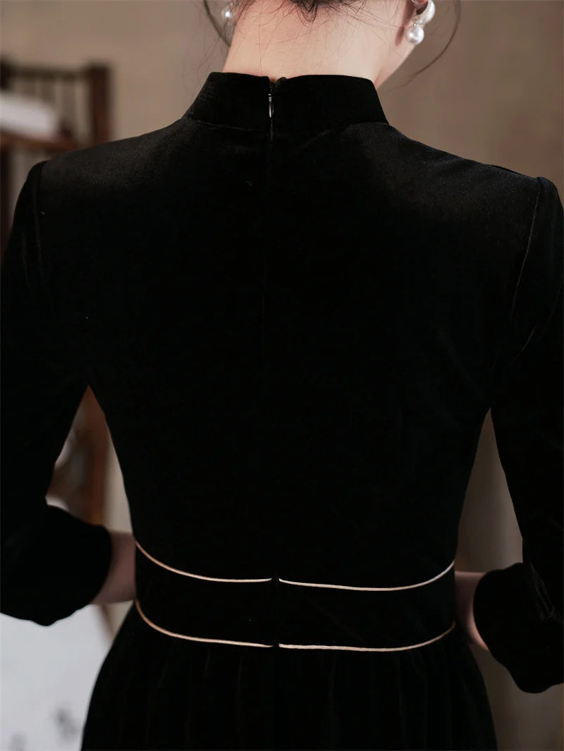  Black 3/4 Long Sleeves A Line Velvet Qipao Dress with   floral embroidery   with a high neckline and long sleeves on a neutral background