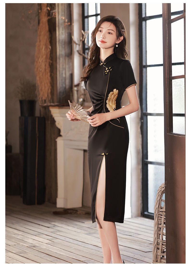 a girl in black modern cheongsam dress. Featuring a peony flower embroidery on the waist , traditional mandarin collar, front side side slit