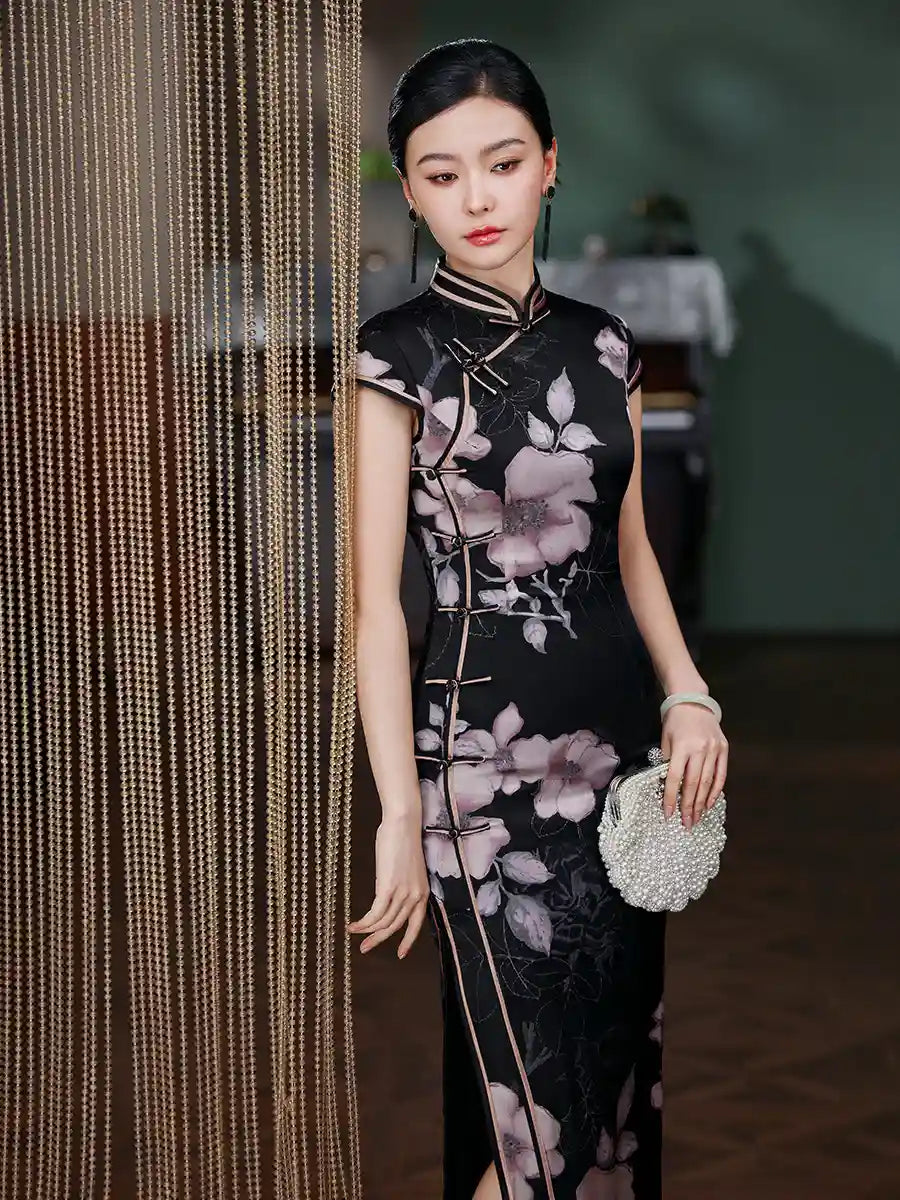 Woman in a Black Silk Chinese Qipao Dress – Elegant Mandarin Collar Cheongsam  holding a clutch, standing next to a beaded curtain.