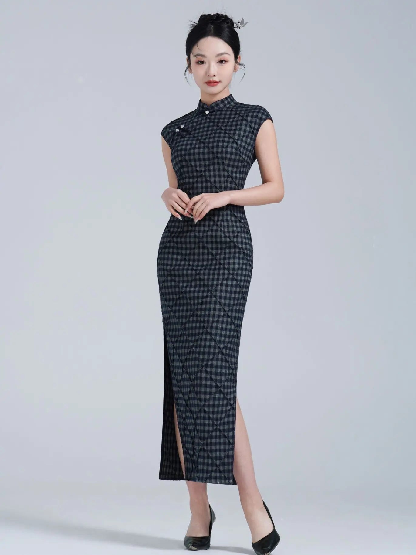 Woman wearing a Black Vintage Plaid Modern Cap Sleeve Qipao Dress  on a white background