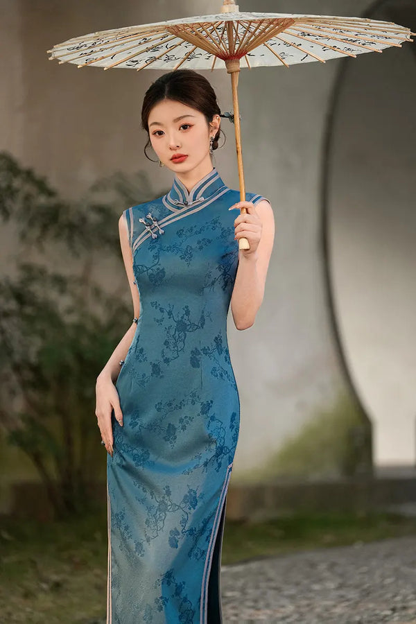 Woman in a Blue Jacquard Sleeveless Midi Qipao Dress holding an umbrella with a blurred background