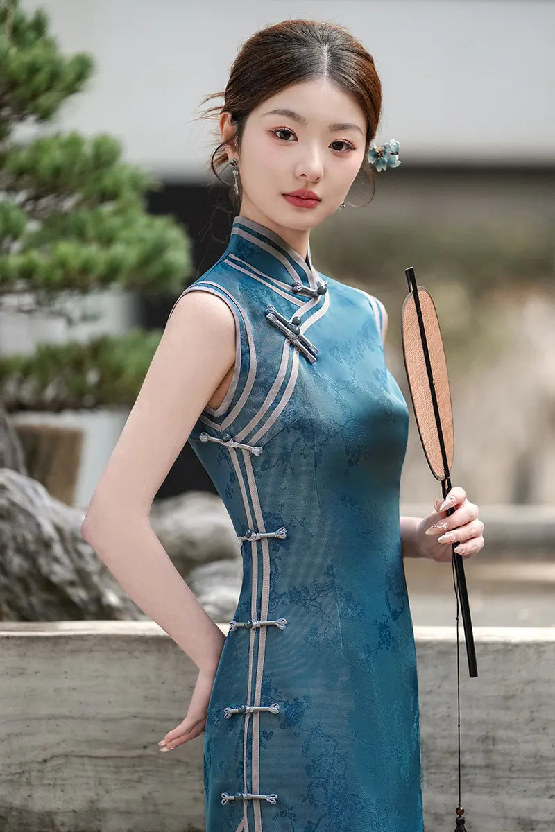 Woman in a blue Jacquard Sleeveless traditional chinese Qipao Dress holding a fan outdoors