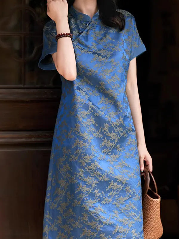 Woman wearing a blue floral Blue Modern Chinese Silk-Cotton Blend Jacquard A-Line Loose Qipao  dress with a dark background