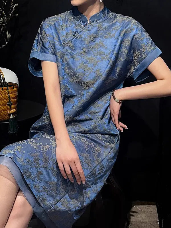 Person wearing a Blue Modern Silk-Cotton Blend Jacquard A-Line Loose Qipao dress against a dark background