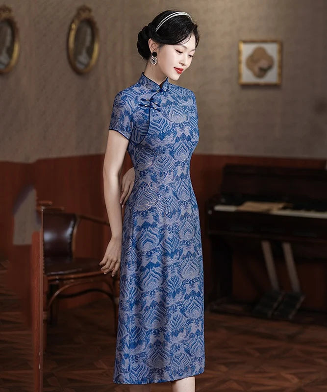 Woman in a Blue Short Sleeves patterned  A-Line Qipao Dress standing in an elegant room with a piano.
