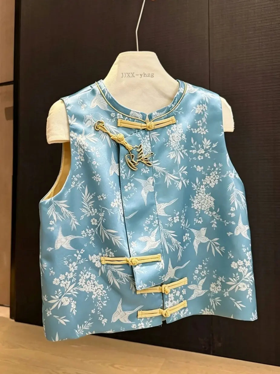  floral patterned Boys' Traditional Chinese Style Blue Vest & Shorts Outfit  with gold accents on a mannequin against a dark background