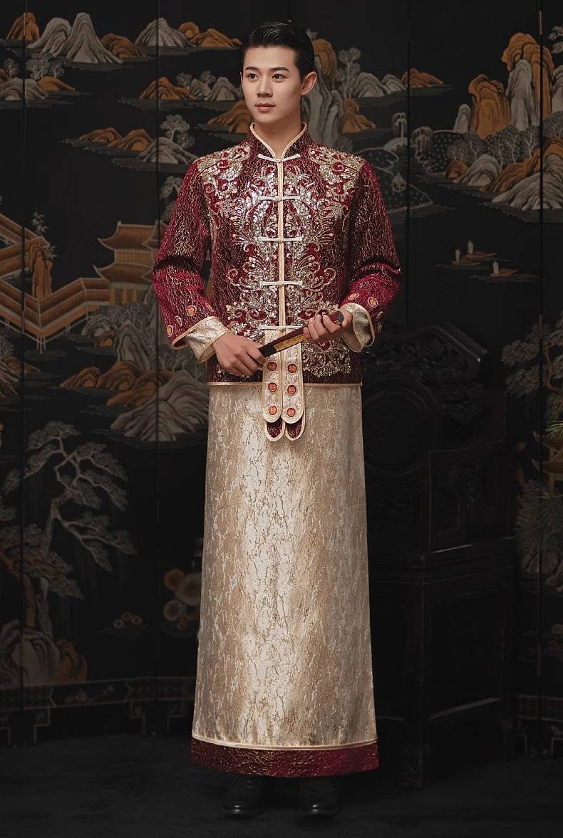 model in traditional chinese Burgundy Gold Groom Tang suit Ma Gua with fan on hand
