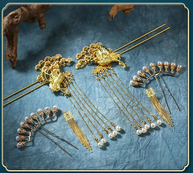 Set of gold Chinese Wedding Crane Hairpin   with tassels and pearls on a textured blue background
