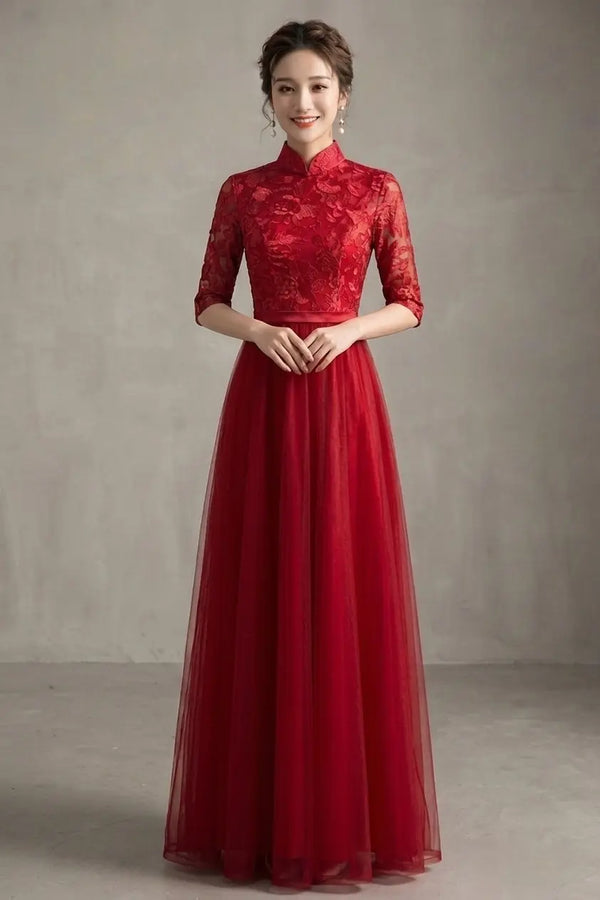 Woman wearing a red Custom Made Lace Tulle Cheongsam/Qipao Dress  evening gown against a plain background